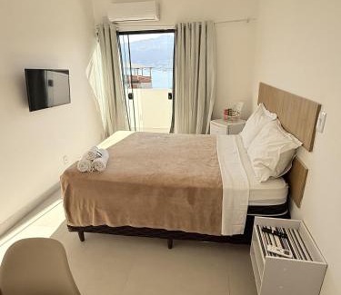 Marinas Haus | Suítes com Vista para o Mar no Marinas - Mirante do Marinas