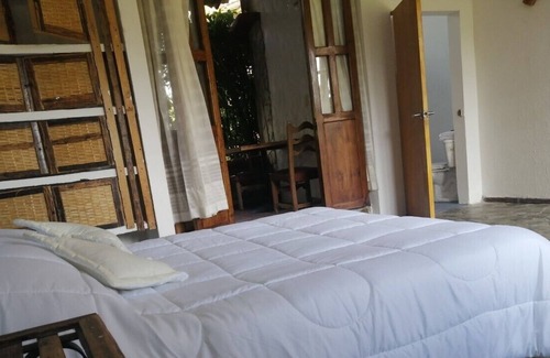 Quimbaya Haus | Suite With Hamaca And Balcony In Front Of Panaca
