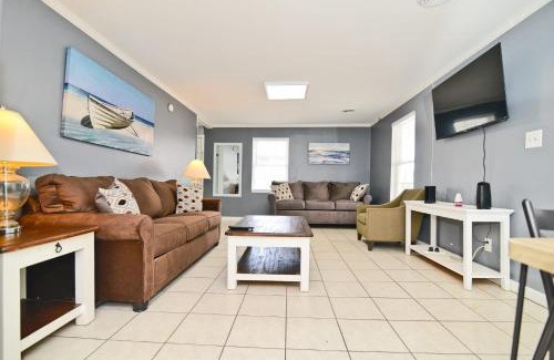 Cherry Grove Beach Haus | Suns Out Steps to Beach w Private Pool in Cherry Grove