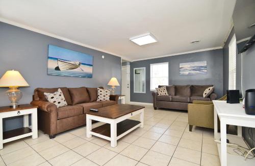 Cherry Grove Beach Haus | Suns Out Steps to Beach w Private Pool in Cherry Grove