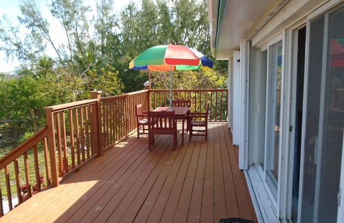 Great Exuma Wohnung | BEEINDRUCKEND!! SPLENDID BEACH APT Slps 8+ & KOSTENLOSER MINIVAN! DIREKT AN DER SUPER HOOPERS BAY