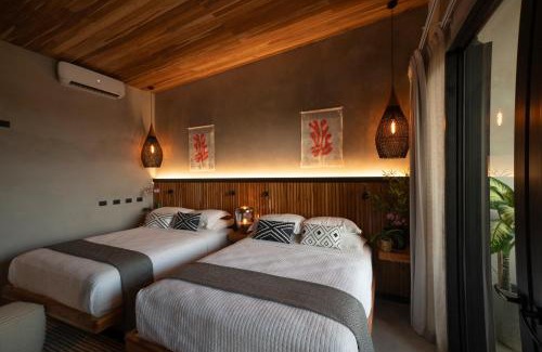 Jaco Kabine | Surf Synergy All-Inclusive Surf and Wellness Retreat