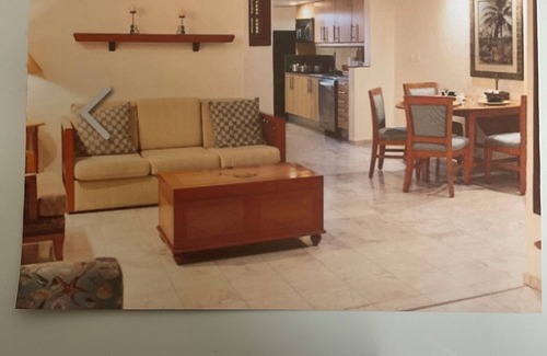 Greening Glade Resort | Taino Beach Bahamas 1 or 2 bedroom suite poolside with covered patio and beach