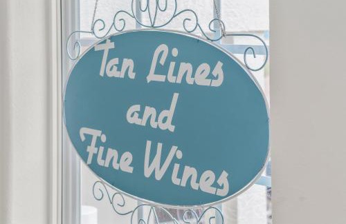 Sand Point Haus | Tan Lines and Fine Wines