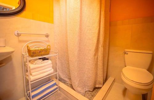 Coral Harbour Haus | Tangerine Sunsets Mango
