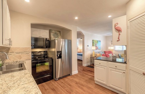 Elizabeth Mcbrides Raulersons Haus | The Adorable Blue Bungalow- Pet Friendly with a fully fenced in back yard.