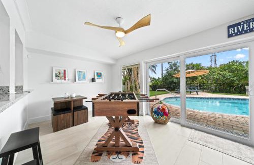 Venetian Way Haus | The Cocoa Plum - A Quiet Riverfront Pool Home Near Beach