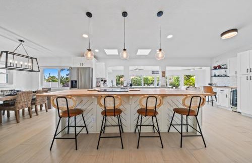 Venetian Way Haus | The Cocoa Plum - A Quiet Riverfront Pool Home Near Beach