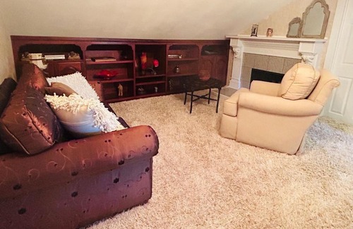 North End Haus | The Doll House an eclectic style of art and old fashioned doll and antique collections in a doll house designed home in Boise's desirable North End across from a nice park with tennis and basement and walking trails near shopping, hiking, biking, skiing