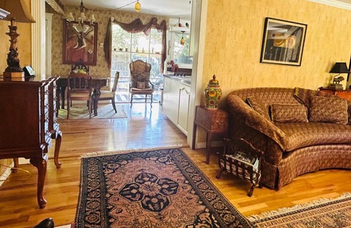 North End Haus | The Doll House an eclectic style of art and old fashioned doll and antique collections in a doll house designed home in Boise's desirable North End across from a nice park with tennis and basement and walking trails near shopping, hiking, biking, skiing