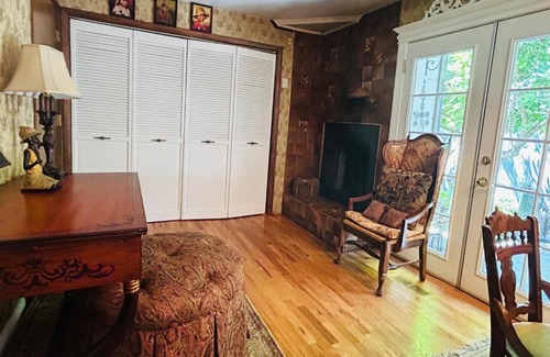 North End Haus | The Doll House an eclectic style of art and old fashioned doll and antique collections in a doll house designed home in Boise's desirable North End across from a nice park with tennis and basement and walking trails near shopping, hiking, biking, skiing