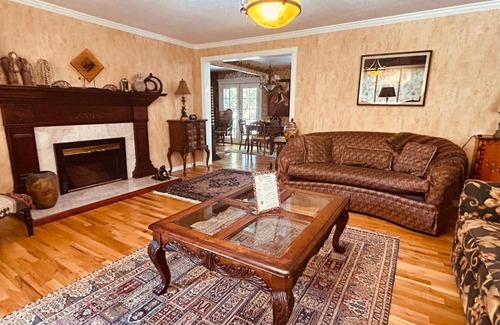 North End Haus | The Doll House an eclectic style of art and old fashioned doll and antique collections in a doll house designed home in Boise's desirable North End across from a nice park with tennis and basement and walking trails near shopping, hiking, biking, skiing