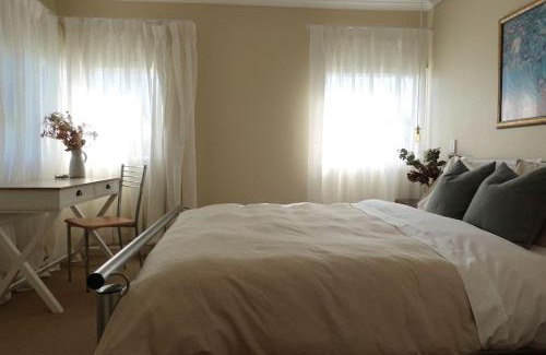 Primrose Sands Haus | The Lazy Fig - Ocean Views, Orchard & Pizza Oven
