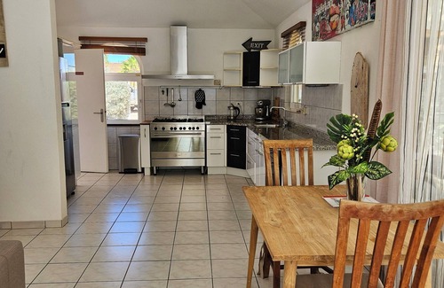 Sabana Liber Villapark Haus | Relaxing 2-bedroom house in enchanting villa park in Noord with private pool