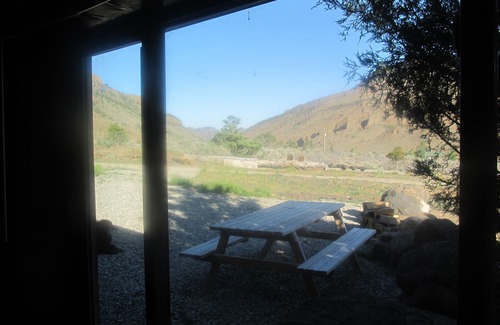 Wapiti Kabine | Die Remington - Yellowstone und Cody Cabin mit spektakulärer Aussicht.