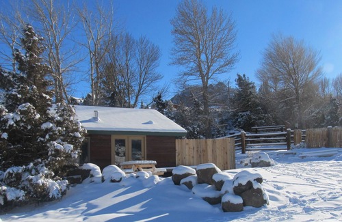 Wapiti Kabine | Die Remington - Yellowstone und Cody Cabin mit spektakulärer Aussicht.