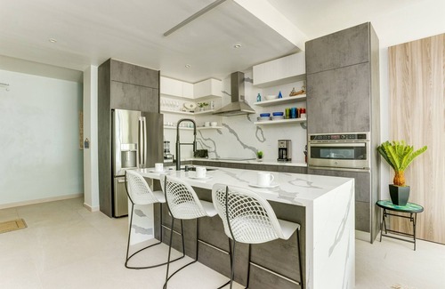 Cocoplum Eigentumswohnung | The Villas at Cocoplum'Trigger Fish' Apartment 112