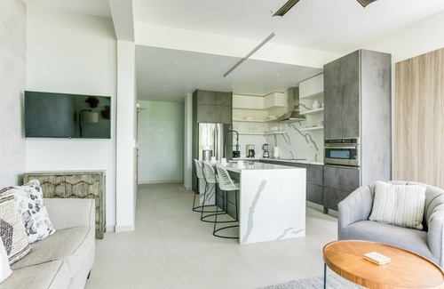 Cocoplum Eigentumswohnung | The Villas at Cocoplum 'Ocelot' Apartment 122