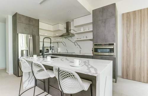 Cocoplum Eigentumswohnung | The Villas at Cocoplum 'Ocelot' Apartment 122