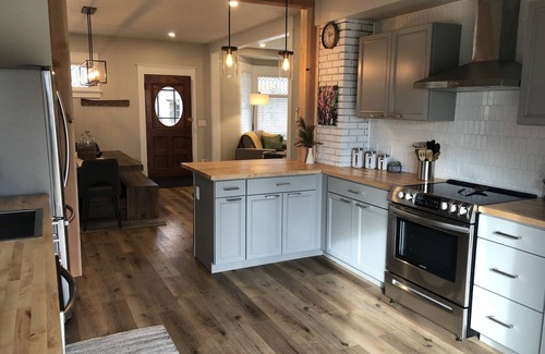 Riverfront Haus | The White Picket Fence - Remodeled Craftsman, Downtown Riverfront Neighborhood