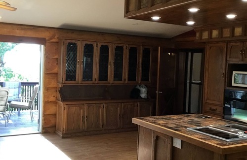 Swift Current Haus | Three level Log Home on Private 40 Acre Estate.