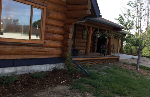 Swift Current Haus | Three level Log Home on Private 40 Acre Estate.