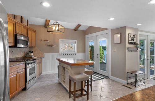 Okauchee Haus | Three steps away from the water on beautiful Okauchee Lake!