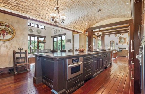 Holland Villa | Timeless Euro Tuscan gated estate on 14.5 acres with vineyard, pond and gardens.