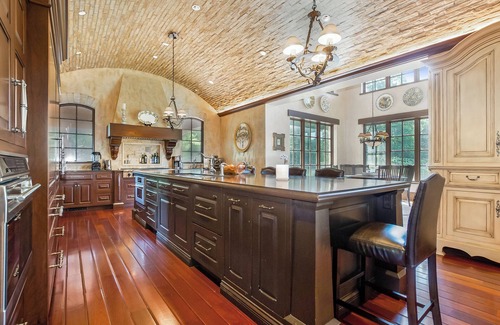 Holland Villa | Timeless Euro Tuscan gated estate on 14.5 acres with vineyard, pond and gardens.