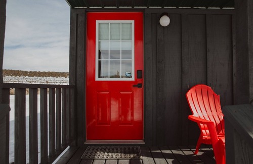Meeker Haus | Tiny Home with one Queen bed and a Futon couch. Sleeps: 3