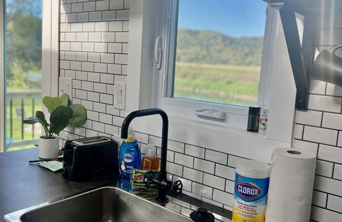 Dorchester Haus | Tiny House on Upper Iowa River w/ hot tub