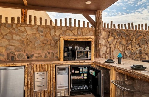 Virgin Wohnmobilvermietung | Tipi Perfect for Stargazing In Zion Chief Tipi #41 on the Pond w/ 1 King Bed, Hot Tub & Outdoor Kitchen