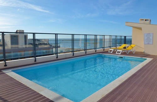 Olhao Wohnung | Apartment in erster Meereslinie auf der obersten Etage, Meerblick, Pool auf der Dachterrasse, historisches Olhao leicht zu Fuß erreichbar