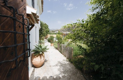 Guajar Faraguit Haus | Casa de vacaciones en Guajar Fondón con priv. Piscina + jardín, vista a la montaña, aire acondicionado, WiFi, SAT-T