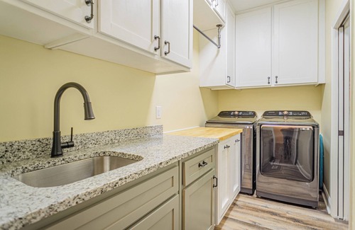 Lee County Haus | Tranquil Getaway Minutes from Auburn including Pool & backyard Waterfall Oasis