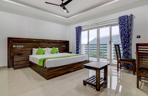 Kannan Devan Hills Hotel | Treebo Tryst Misty Garden Resorts