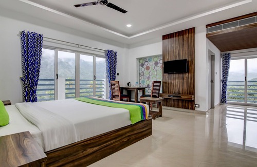 Kannan Devan Hills Hotel | Treebo Tryst Misty Garden Resorts