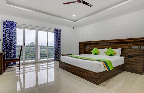 Kannan Devan Hills Hotel | Treebo Tryst Misty Garden Resorts