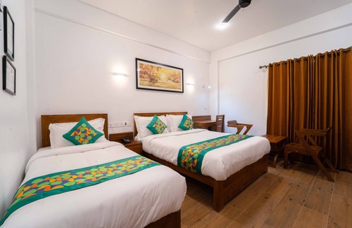 Thiruvananthapuram Hotel | Treebo West Fort Divine