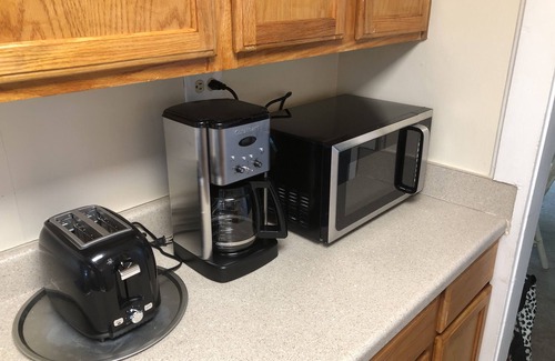 Bayview Hütte | Rustikales Apartment auf dem Dach am Strand mit 2 Schlafzimmern