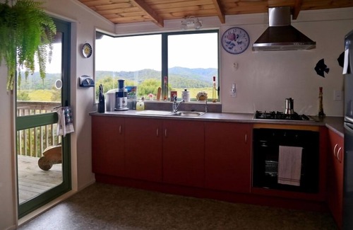 Haruru Haus | Baumkronen - Spektakuläre Aussicht auf Fluss und Meer