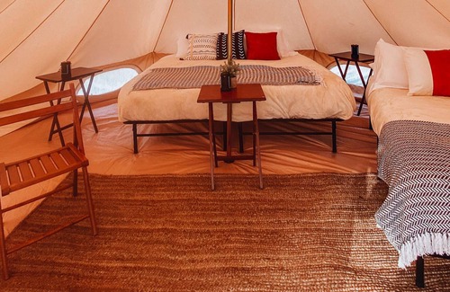 Tropic Haus | Triple Tent w/ Shared Bathroom - Beauty awaits you just past the red cliffs.