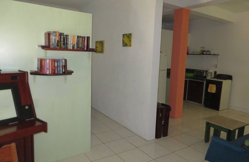 Placencia Wohnung | Tropisches Gartenerlebnis in farbenfroher Umgebung im Herzen von Maya Beach