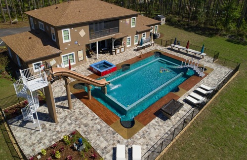 Groveland Haus | Two 10 Acre Huge Pool Estates with Waterslides & Lazy Rivers - Sleep Up To 97