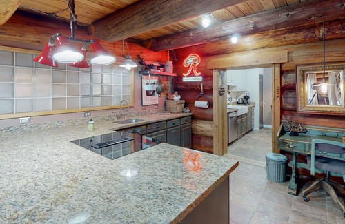 Carnation Haus | Unique mountain view log home with a wood stove, balcony, patio, & board games