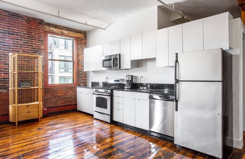 South End Haus | Unique South End Loft w/ Pool, Art Gallery, Steps to T by Blueground