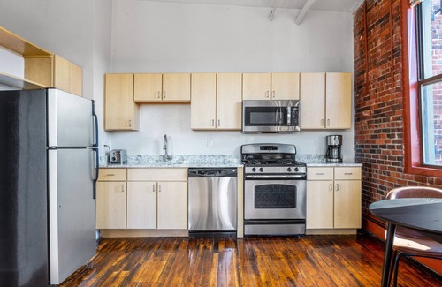 South End Haus | Unique South End Loft w/ Pool, Art Gallery, Steps to T by Blueground