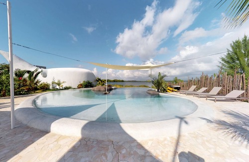 Cocoplum Wohnung | Hundefreundliches Studio am Wasser mit Resort-Annehmlichkeiten, einschließlich Gemeinschaftspool