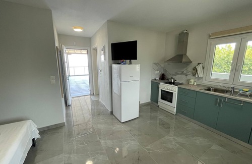 Skotina Wohnung | Einmalig, direkt am feinen Sandstrand, mit weitem Meerblick auf das Meer bis hin