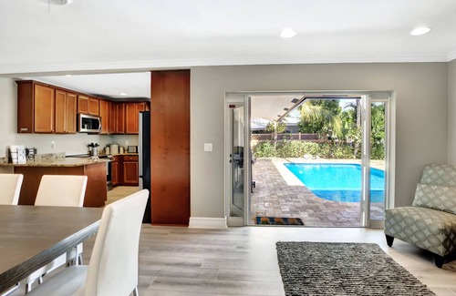 Pompano Isles Haus | Upscale, luxurious WATERFRONT pool home.